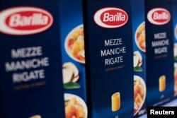 FILE - Packs of Barilla pasta are seen in a supermarket in Rome, Italy, Sept. 27, 2013.