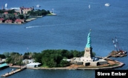This helicopter view shows how close the Statue of Liberty is to Ellis Island. Arriving immigrants would sail past "Lady Liberty" on their way to Ellis Island.