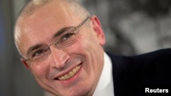 Mikhail Khodorkovsky, freed a year ago after serving prison time for financial crimes, ran oil giant Yukos before it was broken up and nationalized a decade ago.