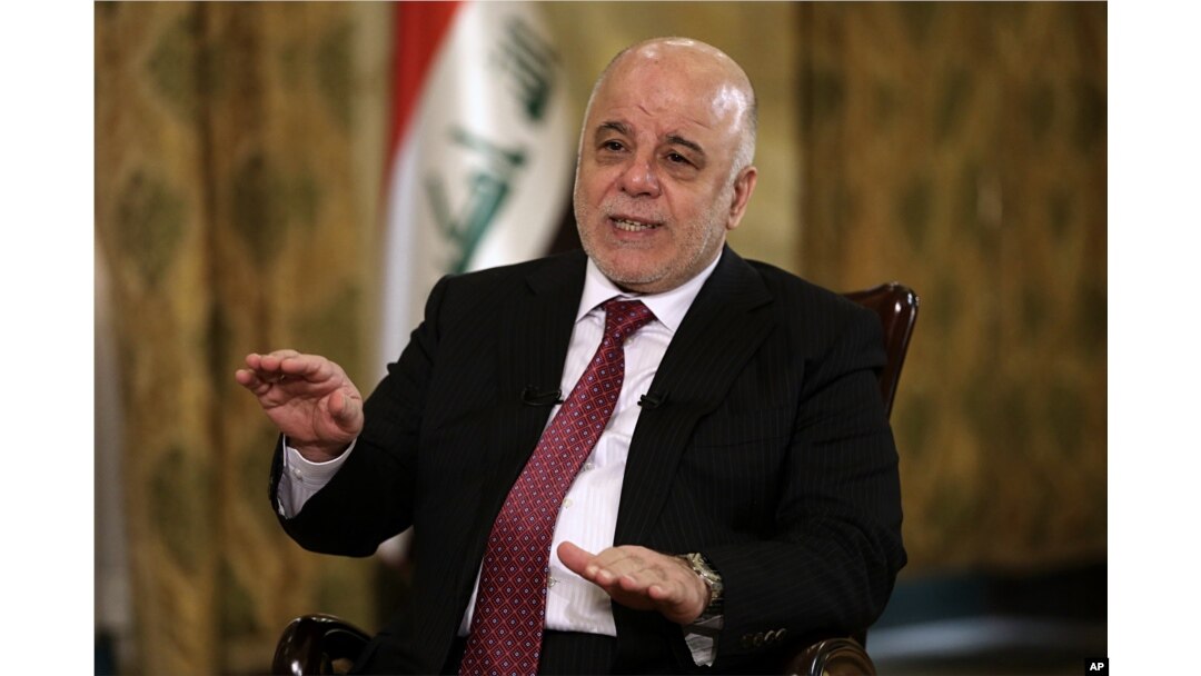 Iraq's Prime Minister Haider al-Abadi speaks during an interview with The Associated Press in Baghdad, Iraq, Sept. 16, 2017.