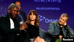 De izquierda a derecha: el actor Mahershala Ali, la actriz Linda Cardellini y el actor Vigo Mortensen en conferencia de prensa para hablar sobre la película "Libro verde" en el Festival Internacional de Cine de Toronto (TIFF) en Toronto, Ontario, Canadá, 12 de septiembre de 2018.
