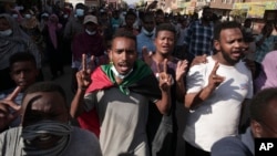 Sudanese protest Wednesday against the military coup that ousted government last month, in Khartoum, Sudan. More protests are planned for Sunday.