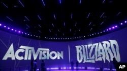 In this file photo, the Activision Blizzard Booth is shown on June 13, 2013, during the during the Electronic Entertainment Expo in Los Angeles. (AP Photo/Jae C. Hong, File)