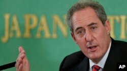 FILE - U.S. Trade Representative Michael Froman speaks during a press conference at the Japan National Press Club in Tokyo, Aug. 19, 2013. 