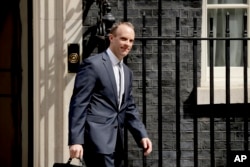 Britain's new Secretary of State for Exiting the European Union Dominic Raab leaves 10 Downing Street after it was announced he was appointed to the job in London, July 9, 2018.