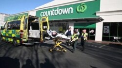 A patient is wheeled to an ambulance after a stabbing incident at the Countdown supermarket, in Dunedin, New Zealand, May 10, 2021 in this screen grab taken from a video. Otago Daily Times/ via REUTERS