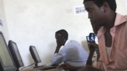Internet users at a cyber cafe in Somalia