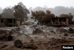 Volcanic rocks are spread around an area that got buried after the eruption of the Fuego volcano at San Miguel Los Lotes in Escuintla, Guatemala, June 6, 2018.