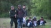 Anggota Milisi Didakwa Setelah Ditangkap di Dekat Perbatasan