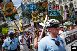 Supporters of Vermont Sen. Bernie Sanders march alongside Philadelphia police during a protest in downtown Philadelphia ahead of the Democratic National Convention, July 24, 2016.