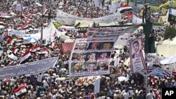 Egyptians crowd at Tahrir Square in Cairo, the focal point of the uprising, to demand justice for victims of Hosni Mubarak's regime and press the new, military rulers for a clear plan of transition to democracy, July 8, 2011