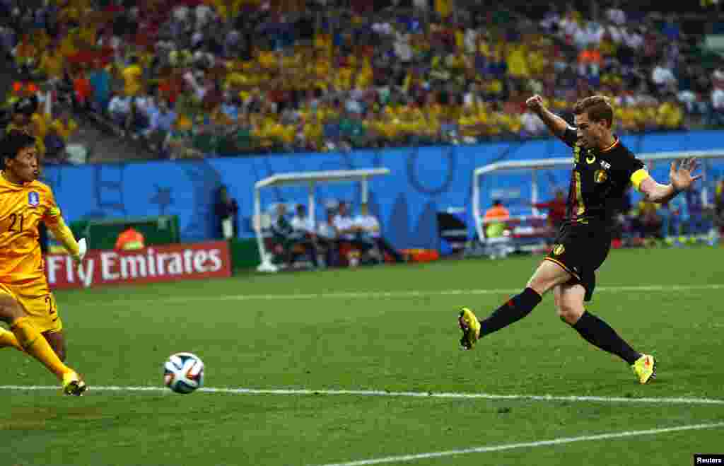 Belgium's Jan Vertonghen scores against South Korea at the Corinthians arena in Sao Paulo, June 26, 2014.