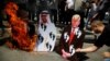 Des Palestiniens brûlent des portraits du président américain Donald Trump, du prince héritier d'Abou Dhabi Mohammed ben Zayed et du Premier ministre israélien Benjamin Netanyahu lors d'une manifestation à Naplouse en Cisjordanie occupée par Israël le 14 août 2020.