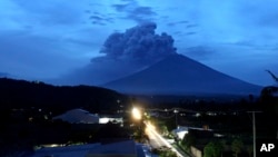 A view of Mount Agung volcano erupting in Karangasem, Bali, Indonesia, Nov. 28, 2017. 