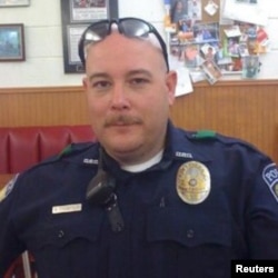 Brent Thompson, of Dallas Area Rapid Transit, one of five officers killed in a shooting incident in Dallas, Texas, U.S., is pictured in this undated handout photo obtained by Reuters July 8, 2016.