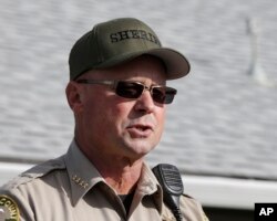 Tehama County Sheriff Dave Hencratt makes a brief statement concerning the shootings near the Rancho Tehama Elementary School, Tuesday, Nov. 14, 2017, in Corning, Calif.