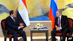 Russian President Vladimir Putin, right, and Egyptian President Abdel-Fattah el-Sissi hold a bilateral meeting on the sidelines of the BRICS Summit in Xiamen, Fujian province, China, Monday, Sept. 4, 2017.