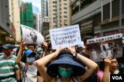 Protesta "Oración por los Pecadores" en Hong Kong, el sábado 31 de agosto de 2019. Miles de manifestantes prodemocracia desafiaron una prohibición de la policía a la protesta, un día después que varios líderes activistas fueron arrestados.