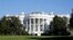 FILE — The White House awash with early morning sun.