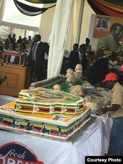 A birthday cake for President Robert Mugabe ...