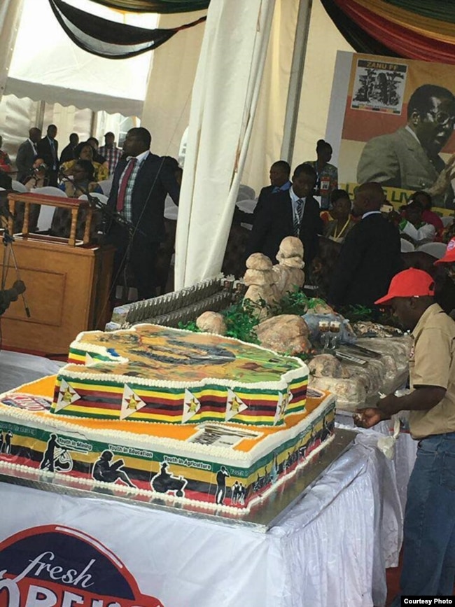 A birthday cake for President Robert Mugabe ...