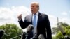 FILE - President Donald Trump speaks to members of the media on the South Lawn of the White House in Washington, May 14, 2019.