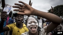 Supporters of the newly elected president of the Democratic Republic of the Congo, Felix Tshisekedi, celebrate in the streets of Kinshasa on January 10, 2019. (John WESSELS / AFP)