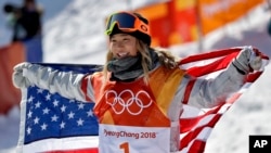 In this Feb. 13, 2018, file photo, Chloe Kim, of the United States, celebrates winning gold after the women's halfpipe finals at Phoenix Snow Park at the 2018 Winter Olympics in Pyeongchang, South Korea. (AP Photo/Gregory Bull, File)