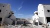 A Palestinian labourer works at a construction site in the West Bank Jewish settlement of Maale Adumim, near Jerusalem December 2, 2012.