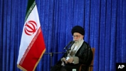 In this picture released by an official website of the office of the Iranian supreme leader, Supreme Leader Ayatollah Ali Khamenei delivers his speech in a ceremony marking 27th death anniversary of founder of the Islamic Republic, Ayatollah Khomeini at his shrine just outside Tehran, Iran on June 3, 2016.