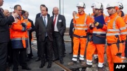 French President Francois Hollande attends the inauguration of the new Sud Europe Atlantique (South Europe Atlantic) high-speed rail line, linking Tours and Bordeaux, on Feb. 28, 2017, in Villognon, central France.