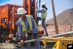 Zamil Akhtar lifts a steel tube holding a rock core sample during a geological research project in the al-Hajjar mountains of Oman, March 1, 2017. Scientists are coring samples from an exposed section of the Earth’s mantle to find out how a spontaneous natural process millions of years ago transformed carbon dioxide into limestone and marble.