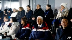 Vice President Mike Pence, second from bottom right, sits between second lady Karen Pence, third from from bottom left, and Japanese Prime Minister Shinzo Abe at the opening ceremony of the 2018 Winter Olympics in Pyeongchang, South Korea, Feb. 9, 2018.