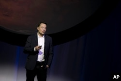 SpaceX founder Elon Musk speaks during the 67th International Astronautical Congress in Guadalajara, Mexico, Sept. 27, 2016.