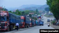တရုတ်နယ်စပ်က မြန်မာကုန်ကားများ (ယခင်မှတ်တမ်းဓာတ်ပုံ)