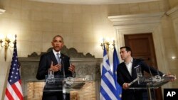 President Barack Obama and Greek Prime Minister Alexis Tsipras participate in a joint news conference at Maximos Mansion in Athens, Nov. 15, 2016.
