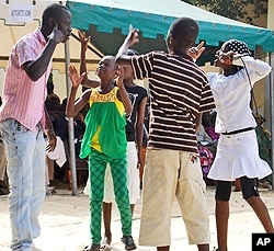 In one skit, children use song to demand adults respect their rights