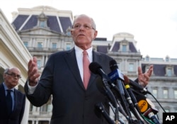 FILE - Peruvian President Pedro Pablo Kuczynski speaks to reporters outside the West Wing of the White House in Washington, Feb. 24, 2017.