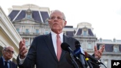 FILE - Peruvian President Pedro Pablo Kuczynski speaks to reporters outside the West Wing of the White House in Washington, Feb. 24, 2017. 
