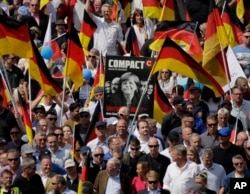 The AfD that swept into Parliament last year on a wave of anti-migrant sentiment is staging a march, May 27, 2018, through the heart of Berlin to protest against the government.