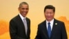 U.S. President Barack Obama, left, shakes hands with Chinese President Xi Jinping during a welcome ceremony for the Asia-Pacific Economic Cooperation (APEC) summit at the International Convention Center in Yanqi Lake, Beijing, China Tuesday, Nov. 11, 2014