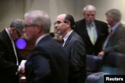 Senator Clyde Chambliss (R), center, is seen with other senators during a state Senate vote on the strictest anti-abortion bill in the United States at the Alabama Legislature in Montgomery, Alabama, May 14, 2019.