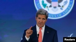 U.S. Secretary of State John Kerry delivers opening remarks at the "Our Ocean" conference at the State Department in Washington, June 16, 2014. 