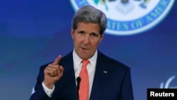 FILE - U.S. Secretary of State John Kerry speaks at the State Department in Washington, June 16, 2014. 