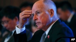 California Gov. Jerry Brown attends the Clean Energy Ministerial International Forum on Electric Vehicle Pilot Cities and Industrial Development, at a hotel in Beijing, June 6, 2017..