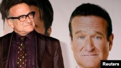 FILE - Actor Robin Williams, star of the new film "Old Dogs" arrives at the film's premiere in Hollywood, California, Nov. 9, 2009.
