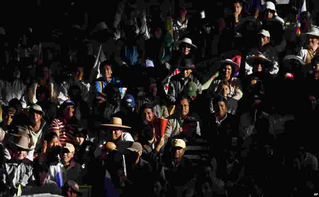 Supporters of Bolivia's President Evo Morales attend the welcoming ceremony for presidents in Cochabamba, Bolivia, July 4, 2013.