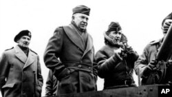 General Dwight Eisenhower in March 1944 between British Air Chief Marshal Arthur Tedder, right, and Field Marshal Bernard Montgomery
