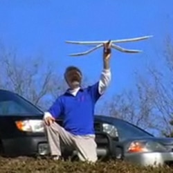 Professor David Alexander launches the University of Kansas model of the microraptor