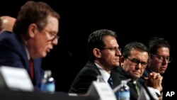 U.S. Trade Representative Robert Lighthizer, left, speaks while Mexico's Chief Technical Negotiator Kenneth Smith, Mexico's Secretary of Economy Ildefonso Guajardo Villarreal, and Mexico's Undersecretary of Foreign Trade Juan Carlos Baker, listen during a news conference, Aug. 16, 2017, at the start of NAFTA renegotiations in Washington. 